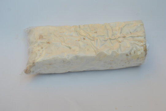 Vacuum Packed Tempeh Block In Plastic Packaging - Fermented Soy Protein Vegan Food