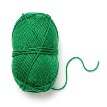 A vibrant green ball of yarn with a loose strand elegantly curved on a white background
