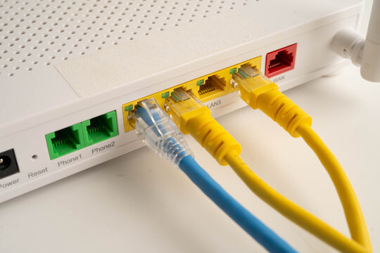 Ethernet cable with wireless router connect to internet service provider network.