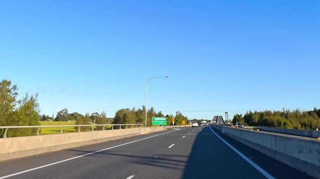 Driving on Pacific Highway Crossing Harwood Bridge in New South Wales