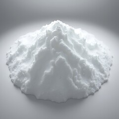 Fototapeta premium A pile of white powder on a gray surface