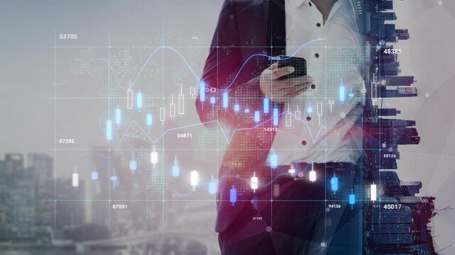 Businessman using smartphone while analyzing financial data and trading charts in modern urban environment with skyscrapers in background. Entropy.