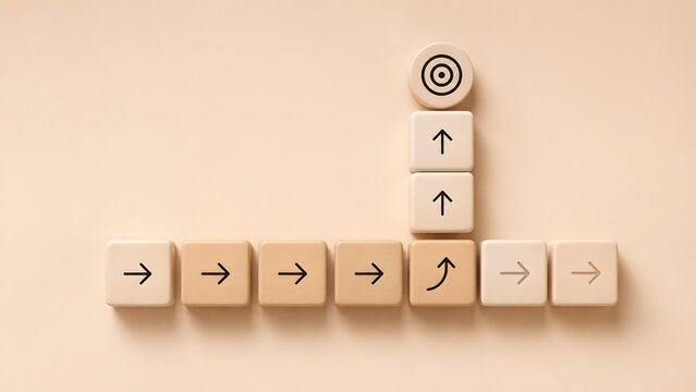 Beige tiles with arrows showing one breaking away from the linear path to reach a target symbolizing innovation and unique business strategy.