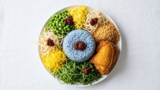 Nasi Kerabu: A Vibrant Blue Rice Dish with Assorted Toppings and Fried Chicken