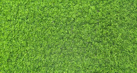 Obraz premium Lush green artificial turf lawn texture