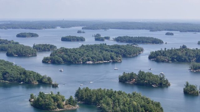 Aerial view of lush islands and blue water in the 1000 Islands region, St. Lawrence River, Canada. g
