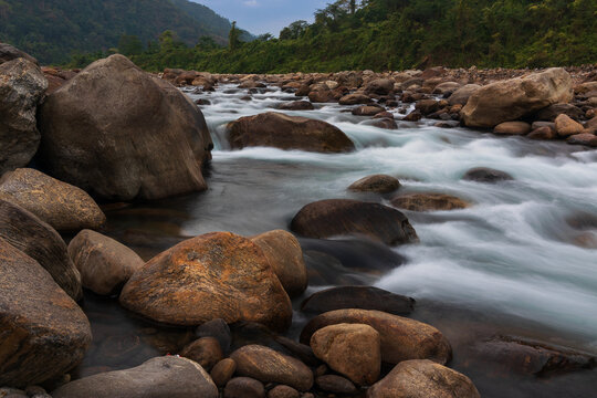 Jaldhaka River, flowing through India, Bhutan, and Bangladesh. Originating from Kupup Lake in East Sikkim. Stones at river bed of Joldhaka river, Jhalong - Dooars , north bengal - West Bengal, India.