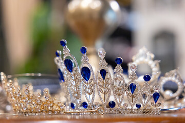 Elegant tiaras sparkle with deep blue stones © Rattanachat