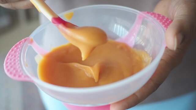 Mixing baby food at home with simple ingredients