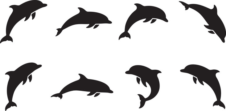 Graceful dolphins swimming and jumping in ocean waves silhouettes