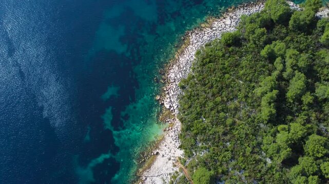Aerial view of the croatian coastline with a rocky beach