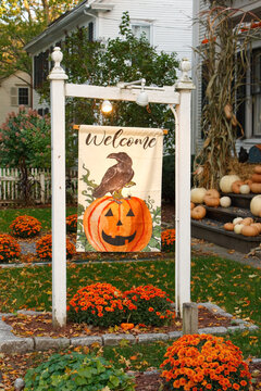 A Halloween welcome sign placed in a house front yard in Woodstock, Vermont