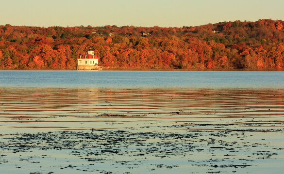 View of Hudson River on an autumn afternoon with Esopus Meadows Lighthouse on the left, near Port Ewen, New York