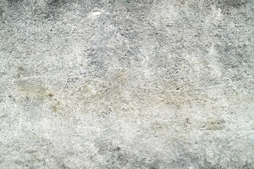 Fototapeta premium Faded stained old concrete wall background.