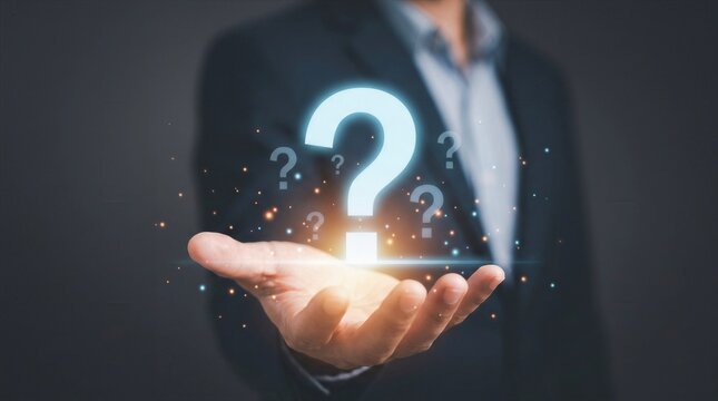 Businessman holding glowing question mark symbol concept for problem solving and FAQ