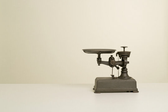 Vintage mechanical weighing scale retail and measurement concept