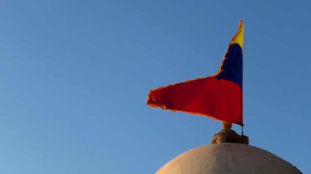 Colorful flag flying above the Rukmini Devi Temple, Dwarka, Gujarat, India