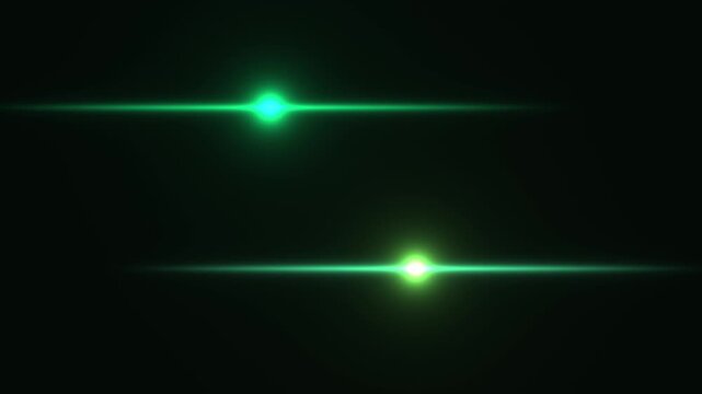 Green light streaks appear and move swiftly across a dark background, creating a sense of motion and energy. The lights vary in brightness and position, adding dynamic elements