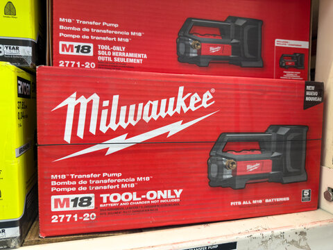Milwaukee M18 Transfer Pump Boxes on Store Shelf