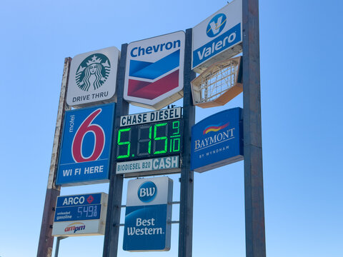 Roadside Business Sign Featuring Fuel Hotels and Coffee