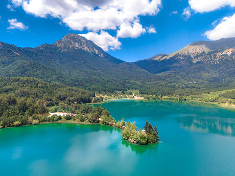 Aerial view of Lake Doxa with Agios (saint) Fanourios chapel in Peloponnese, Greece