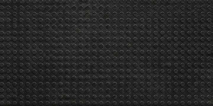 A high-resolution black rubber industrial background featuring a durable textured surface with a realistic matte finish.