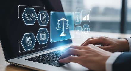 Fototapeta premium Legal Technology Expert Working on Laptop with Digital Law Concepts