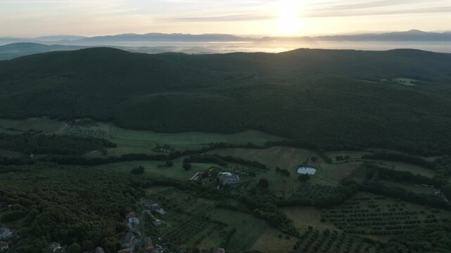 Aerial Sunrise Over Amelia Italy Near Umbria Quiet Countryside Village With Rolling Hills, Farmland and Morning Light