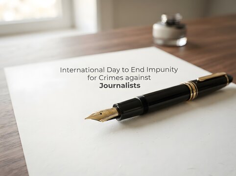 Fountain pen on paper for international day to end impunity for crimes against journalists