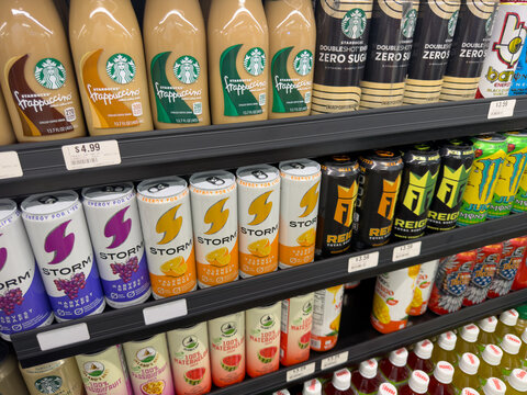 Assorted Starbucks Coffee And Energy Drinks On Store Shelf