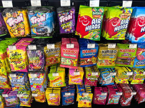 Colorful Assorted Candy Bags On Grocery Store Shelf