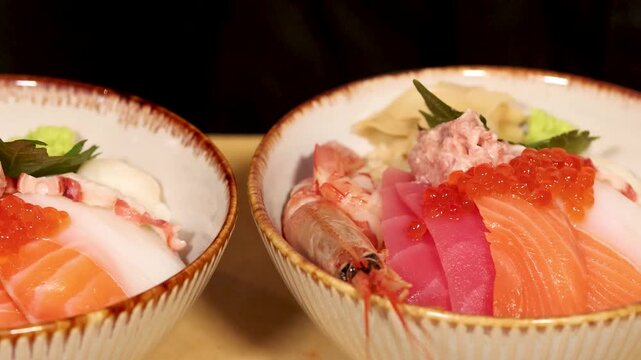 Japanese Sushi Chef Preparing Fresh Seafood Chirashi Bowl with Sashimi