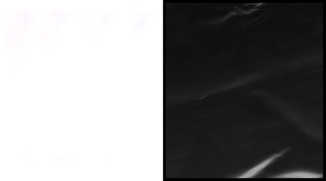 Crumpled black plastic texture background, wrinkled dark cellophane wrap surface, glossy synthetic film material with highlights and creases