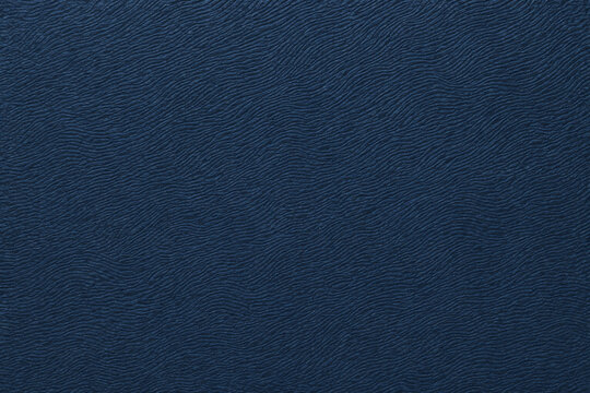Navy textured paper with fine organic grain and deep matte finish. Elegant dark surface ideal for stationery, packaging, backgrounds, and modern decorative design applications.