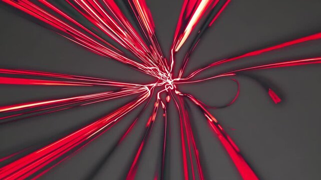 Abstract red light streaks radiate from a central point against a dark background, creating a dynamic visual effect that emphasizes motion and energy flow