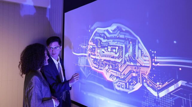 Seminar woman with man in conversation for ai governance, machine learning, Presenter promoting artificial intelligence solutions, Strategy plan to executive write prompt AI bot IT app program.