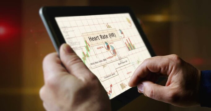 Health heart and body wellness charts and graphs diagram on touchscreen pad display. Finger touch tablet screen in hand. Digital analysis and report.