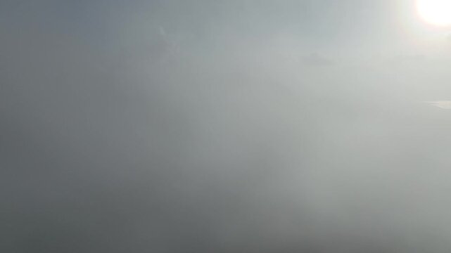 sun shining through the clouds
