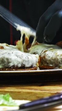 Fresh burgers on the plate - commercial kitchen