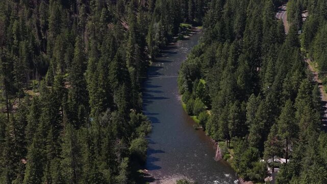 Aerial Naches River in Wenatchee National Forest in central Washington in summer along WA 410 forested paved road