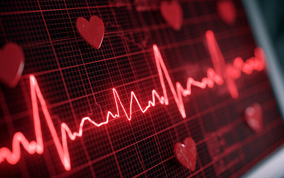 Close-up of a vibrant red electrocardiogram displaying a healthy heartbeat and heart symbol on a monitor