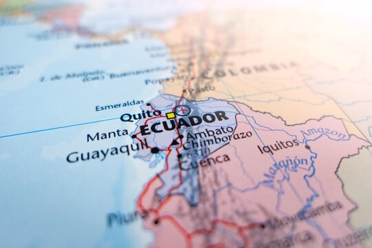 Map of Ecuador with flare from top right corner. Selective focus on label, close-up view