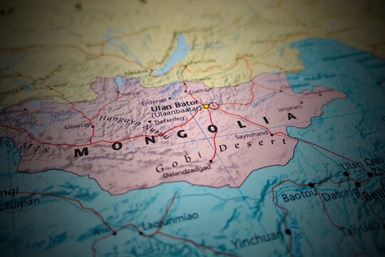 Map of Mongolia with round vignette. Selective focus on label, close-up view