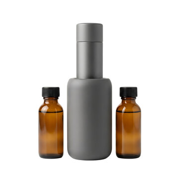 One large grey matte cosmetic bottle and two small amber glass essential oil bottles