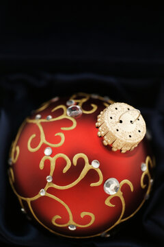 Elegant red holiday bauble with copy space