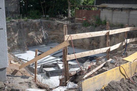 House construction, foundations of a new building.
