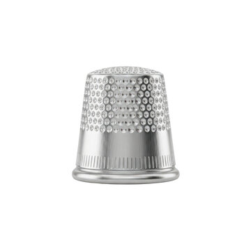 Silver metal sewing thimble isolated on a white background with sewing kit
