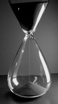 black sand hour glass