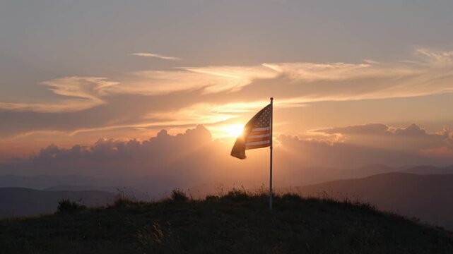 A powerful and patriotic cinematic wide shot of a lone, weathered American flag planted on a grassy hilltop, standing as a stark silhouette against a breathtaking sunrise. 