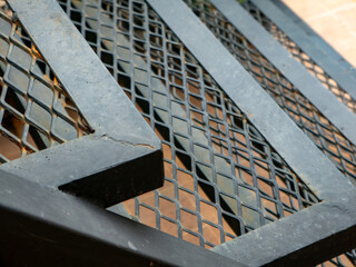 Industrial Expanded Metal Mesh Staircase Grating, Rusty Steel Texture Close-Up © Tavan